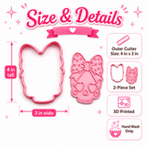 Pink cookie cutter set shown with dimension labels and feature callouts on a white background. The set includes a large bunny-shaped cutter and a bow-and-skull-shaped cutter, with text reading 'Size & Details' and details such as outer cutter size 4 in x 3 in, 2-piece set, 3D printed, and hand wash only.